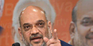 किसान आंदोलन को लेकर जारी हमलों के बीच अमित शाह ने नकद लाभ योजना का दिया हवाला